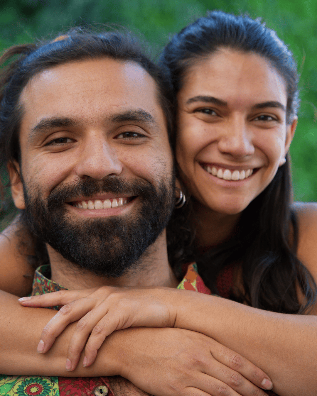 Pauli and Nacho smiling at camera