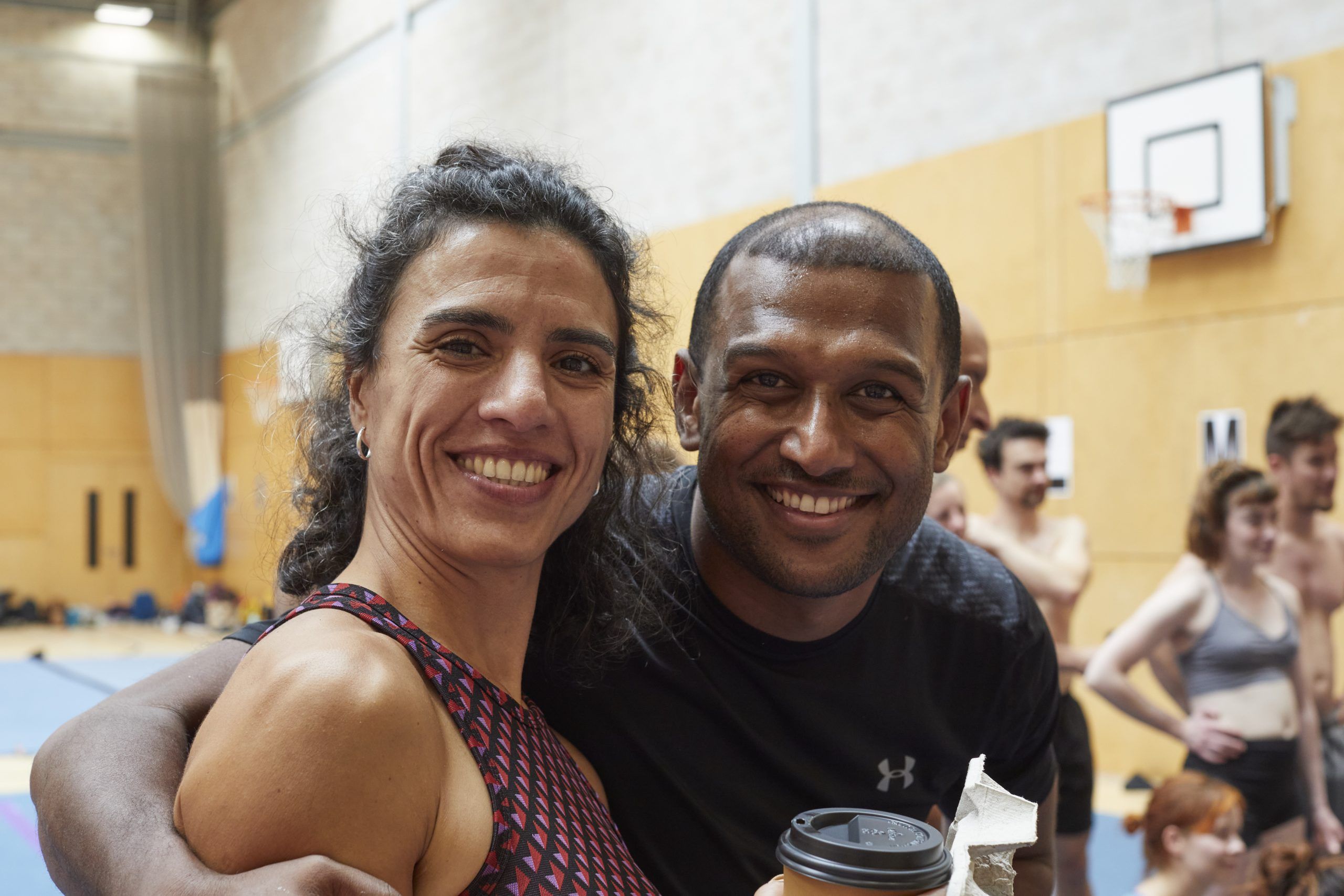 Erica Montes and Kiran koottungal smiling and hugging at London Acro Convention 2025