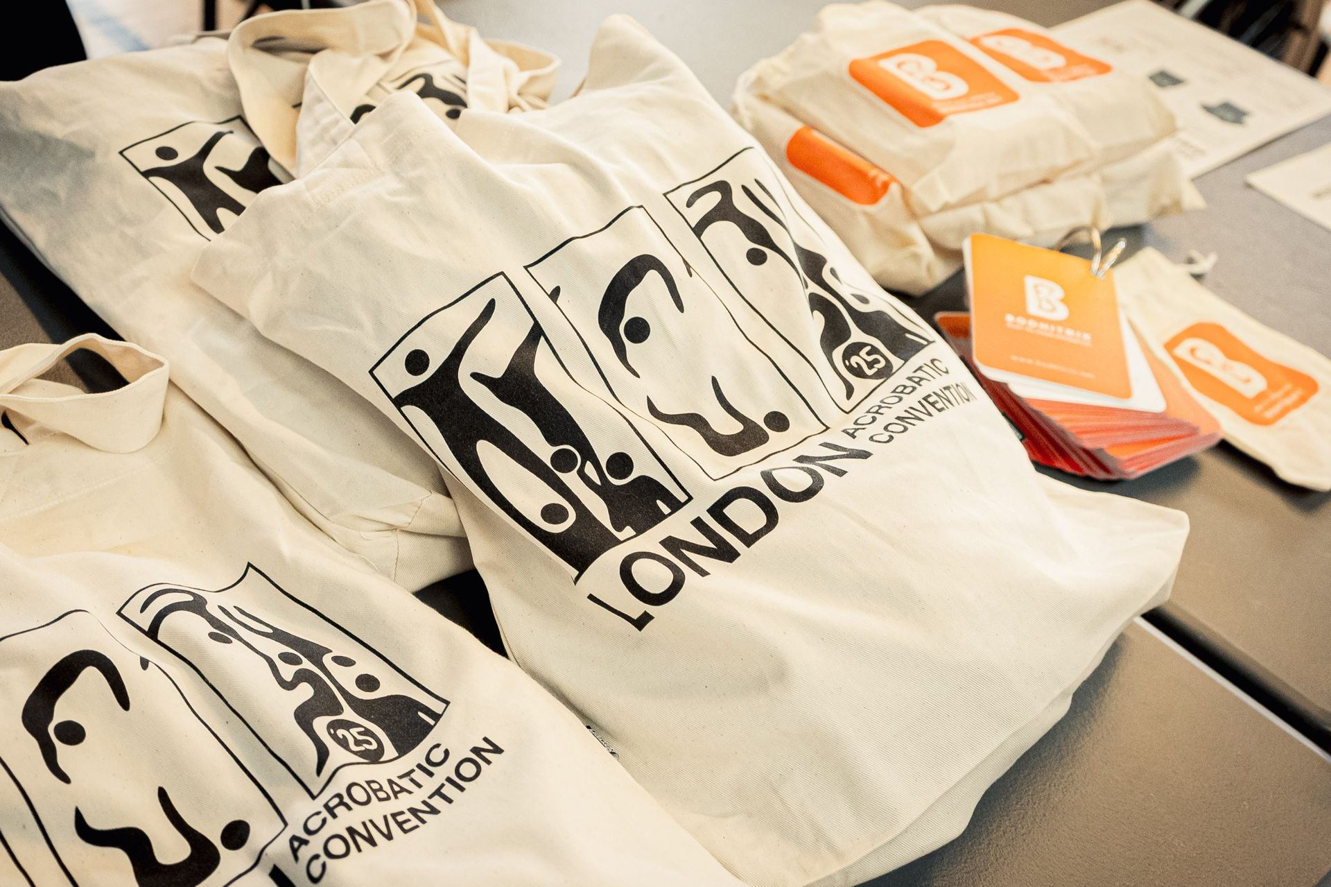 Sample LAC merch showing tote bags and other products